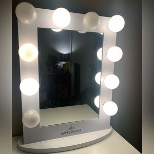 impressions vanity mirror